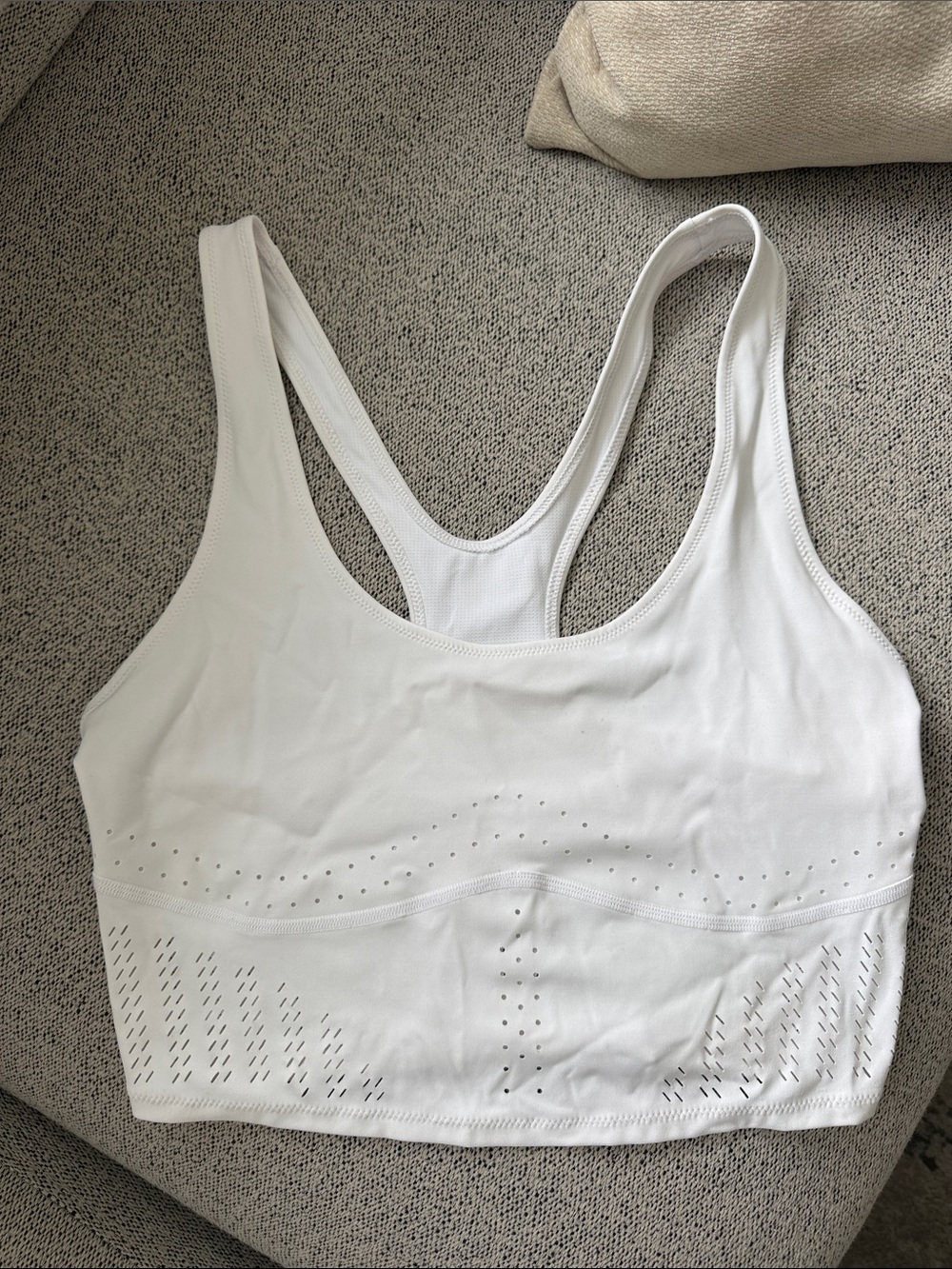 bandier white laser cut crop tank